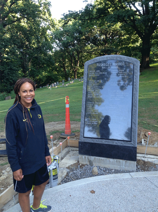 Lauren standing next to The Roll of Honor